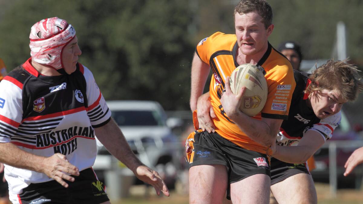 Burrangong players tackle their Canowindra opponent during the 2018 Woodbridge Cup season. The Bears have folded a couple of weeks out from round one. Photo: RS Williams