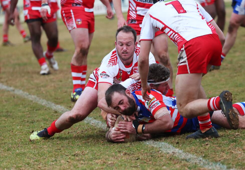 Blake Hewitt crashes over for Young right on half-time to give them plenty of momentum in the narrow loss to Temora. Picture: Emma Hillier