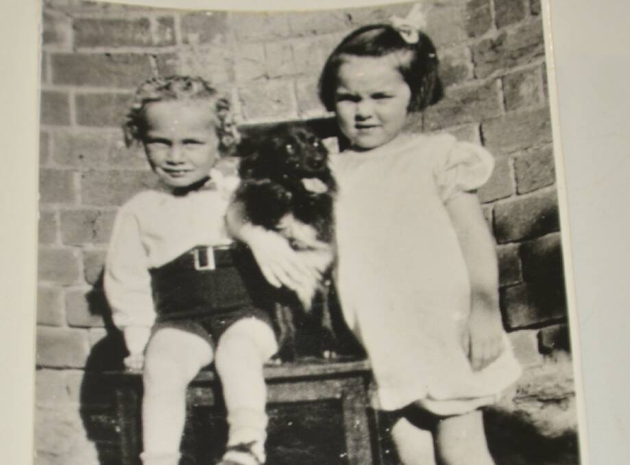 A photo of a photo taken in Young in 1935 that was sent to Young Library. It's believed the people in the photo are named Sybil and Maurice.