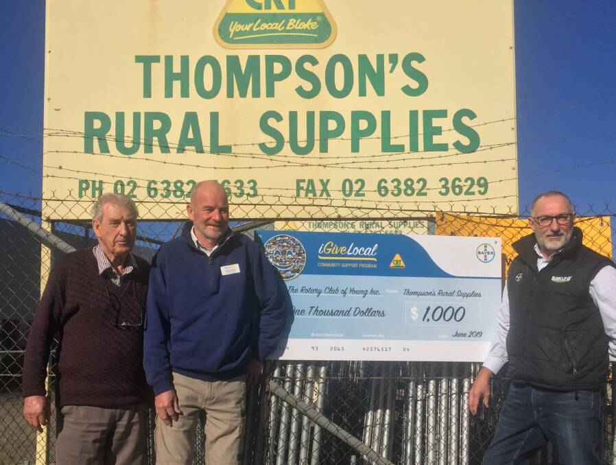  Frank Thompson (Thompsons Rural Supplies Young), John Payne (Rotary Club of Young) and Ross Henley (Bayer) with a cheque for $1000 presented to Rotary.