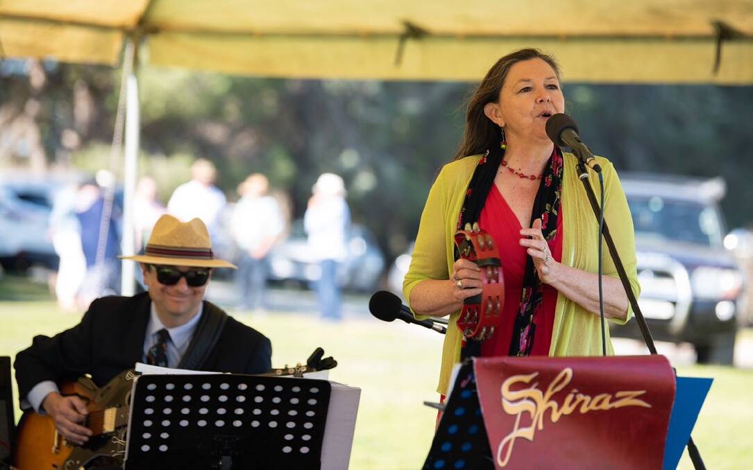 Judy Baker from Shiraz entertained guests at Sunday's luncheon in the orchard.