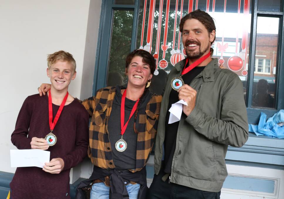 Winners are grinners: Matthew Murphy, Pauline from France and Ben Wilkinson. Picture: Amanda Langman.