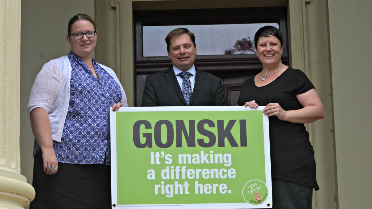 Giving a Gonski: NSWTF Kelly Anderson, Young High School's Keith Duran and Victoria Greenaway were happier with the original Gonski plan. Picture: Craig Thomson.