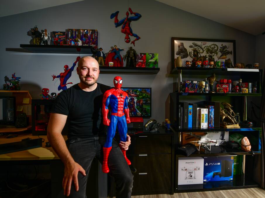 SUPERHERO: Marvel artist Patrick Brown in his Launceston studio. Picture: Scott Gelston