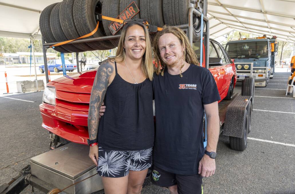 Leah and Blake Poiset, from Camden, take their annual holidays to tow their VK Commodore down to Summernats, with their four kids. Picture by Gary Ramage 