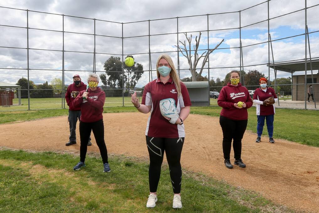 NO-GO ZONE: Keith Quinn (left), Tracey Chadwick, Joanna Garoni, Catherine Garoni and Liz Quinn are disappointed they can't play softball, due to COVID. The decision has stalled plans to recruit players. Picture: TARA TREWHELLA
