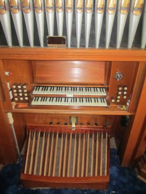 The Dodd pipe organ showing the manuals (keyboards) and recently restored pedal keyboard. 