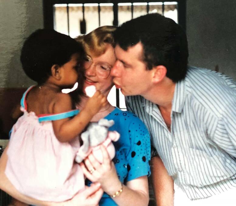 Samara Johnston aged two, with her parents Lindy and Peter at the orphanage in Sri Lanka. PHOTO: Samara Johnston