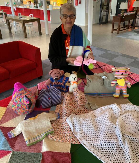 Ronald McDonald House Orange volunteer Judy Reppen with a sample of the items which can be donated to the house.