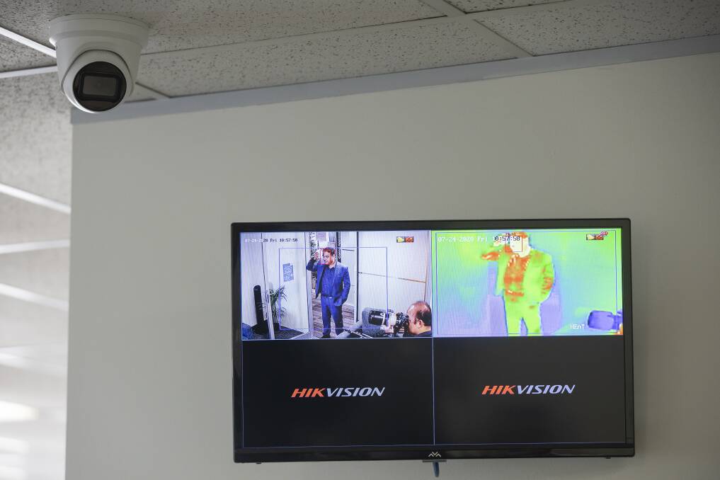 Upon entering the Himalayan Business Group office, visitors are scanned with thermal fever detection cameras, which have been installed to help keep the business COVID-safe. Picture: Sitthixay Ditthavong 