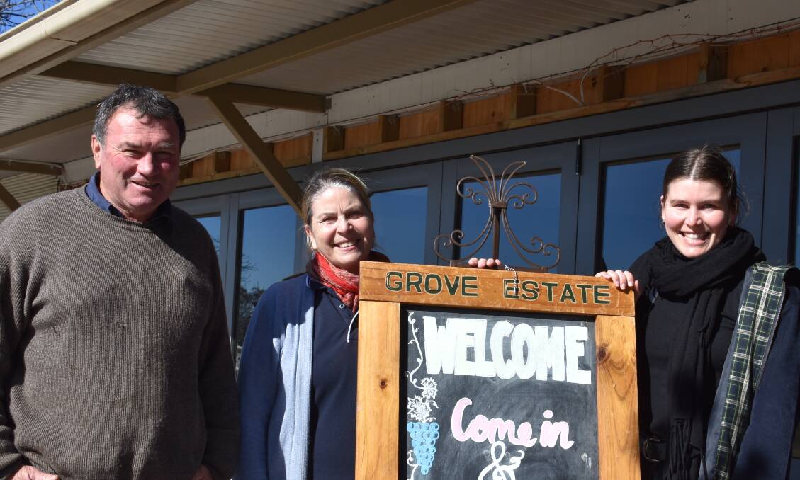 Brian and Sue Mullany and their daughter Alexandria Mullany from Grove Estate. Their cellar door has seen an influx of visitors since reopening two weeks ago. Photo: Peter Guthrie