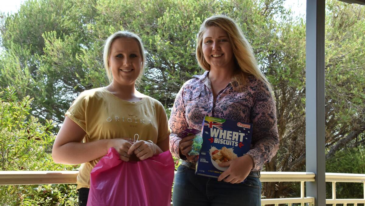 Amy Dawe and Chontelle Perrin with supplies to be donated to animal rescue organisations. Photo: Peter Guthrie