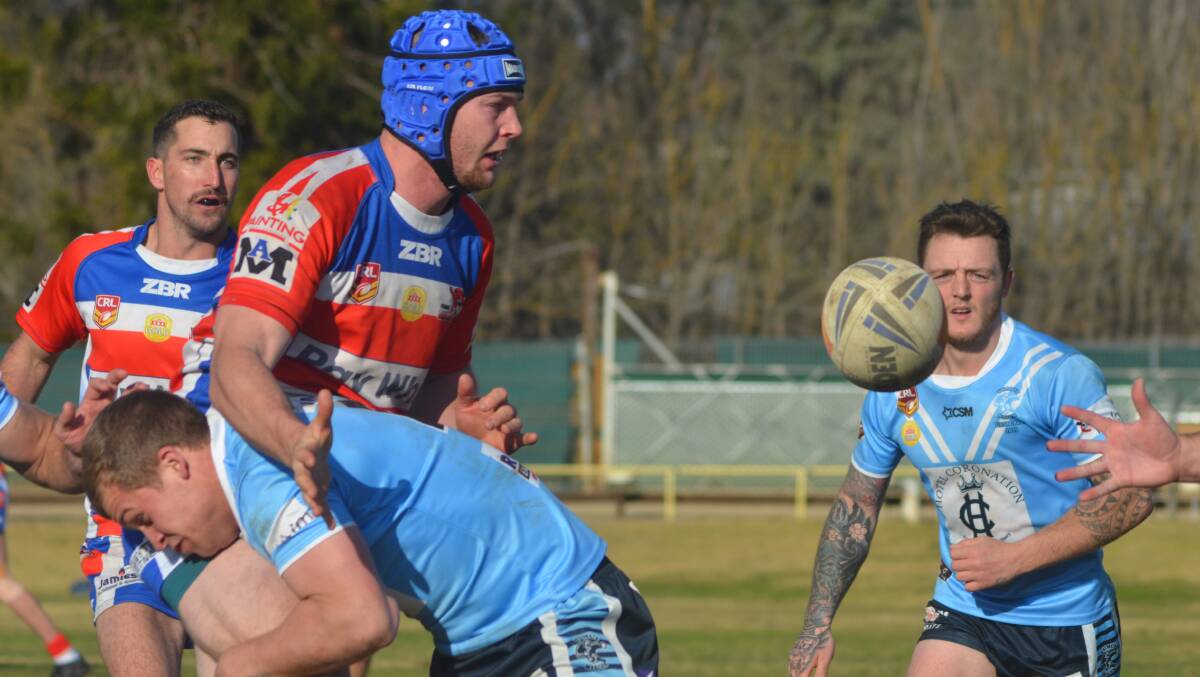 Kye Tiedemann pictured offloading in Young's loss to Tumut at Alfred Oval on Sunday.