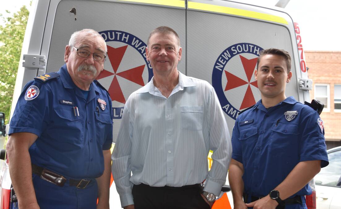 Ambulance Inspector Stephen Pollard, cardiac arrest survivor Murray Hanley and paramedic Ian Pollard.