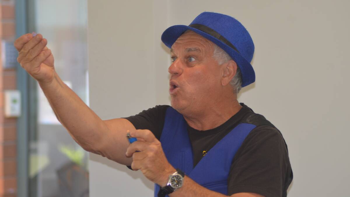 Troppo Bob pictured while performing an illusion at Mercy Place Mount St Joseph's Aged Care on Friday morning.