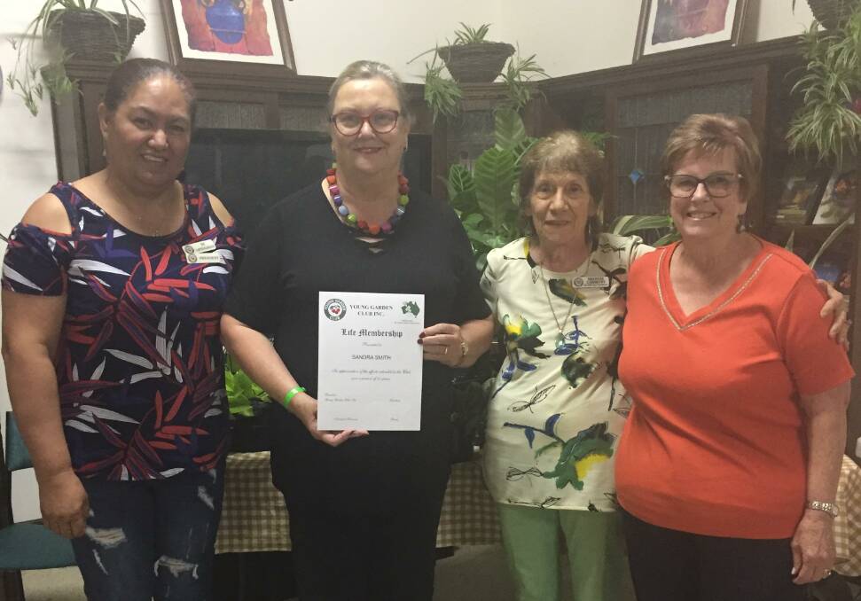 Treasurer Sandra Smith is presented with a life membership certificate. She's pictured with Joy, Helenie and Moya. Photo: contributed 