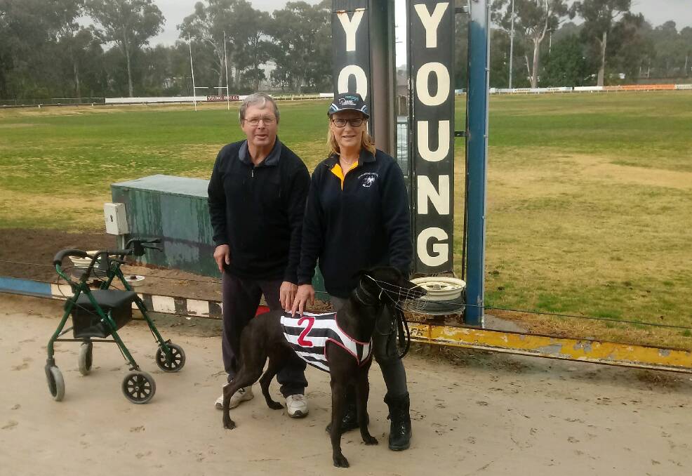 Gary Kimber and Vicki Wilder after Corleone King smashed the 347m track record at Young 19.48 seconds.