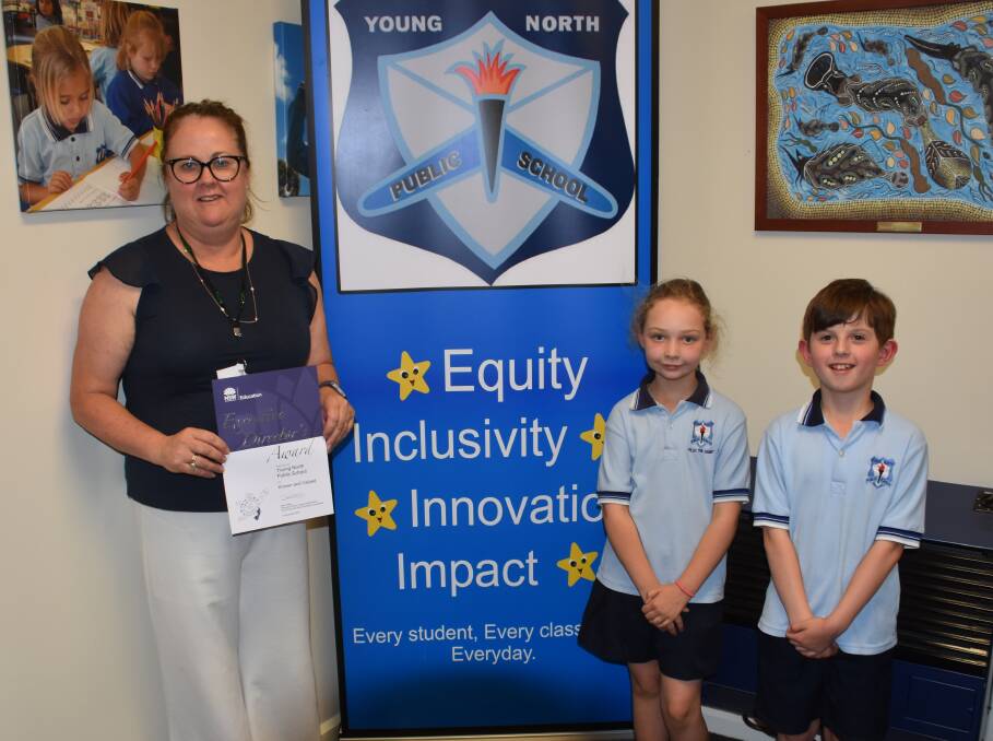 Young North Public School principal Ange Gay with Year 2 students Lucy Martin and Jackson Kirk. Photo: Peter Guthrie