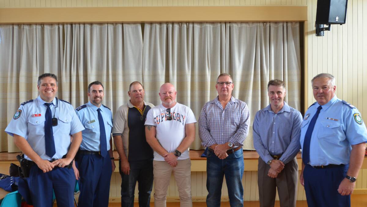 Young Police Inspector Jacob Reeves, Hume Police District Superintendent Chris Schilt, retired Senior Constables Glen Keane and Matt Dreverman, retired Detective Inspector Scott Wilkinson and retired Chief Inspector Ashley Holmes with NSW Police Deputy Commissioner Gary Worboys. Photo: Peter Guthrie