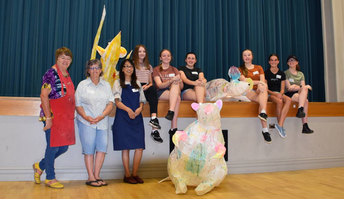 Artist Tracy Luff with the participants of the two-day lantern making workshop. Photo: Peter Guthrie