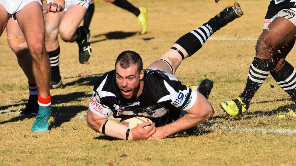  John Grant crashes over for a try while playing for Cowra Magpies in Group 10. He signed with Young in 2020.