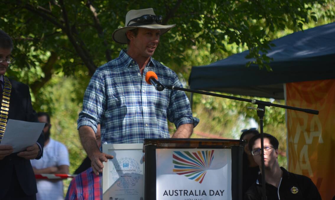 Michael Beveridge accepts the Young Environmental Citizen of the Year award at Young's Australia Day ceremony at Carrington Park. 