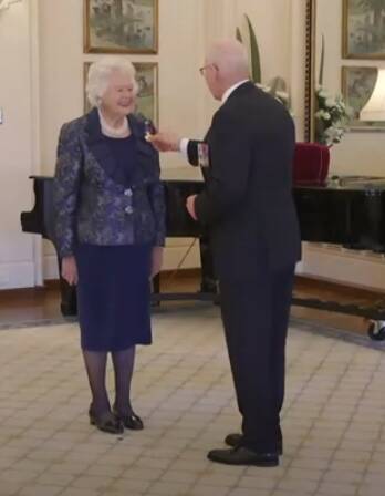 Young's Nancy McGregor receives her Order of Australia Medal from Governor General of Australia David Hurley. 