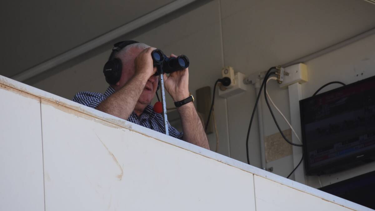 Stuart Maxwell calls the action from the broadcaster's box at the Young Paceway. Photo: file