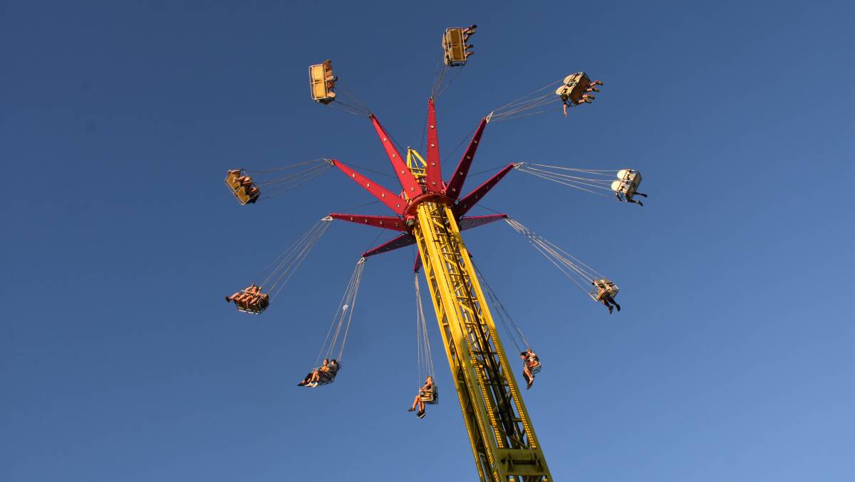 Festivalgoers enjoy a ride at last year's National Cherry Festival. Photo: file