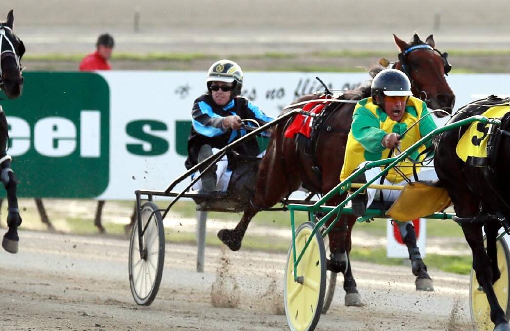 Topsie Grinner, inside (red rug),with Jordan Seary in the gig, converted form into a win on Friday at Wagga's Riverina Paceway. Photo: file