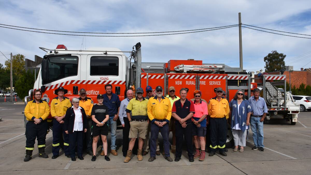 Robert Donges with representatives from various NSW Rural Fire Service brigades in the Young district. Photo: Peter Guthrie