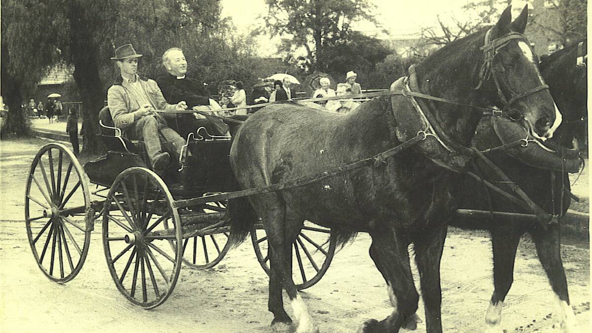 Stan Krebs, Charlie's grandson, driving Reverend Alan Cole at the Cherry Festival in the 1960s. Photo: contributed 