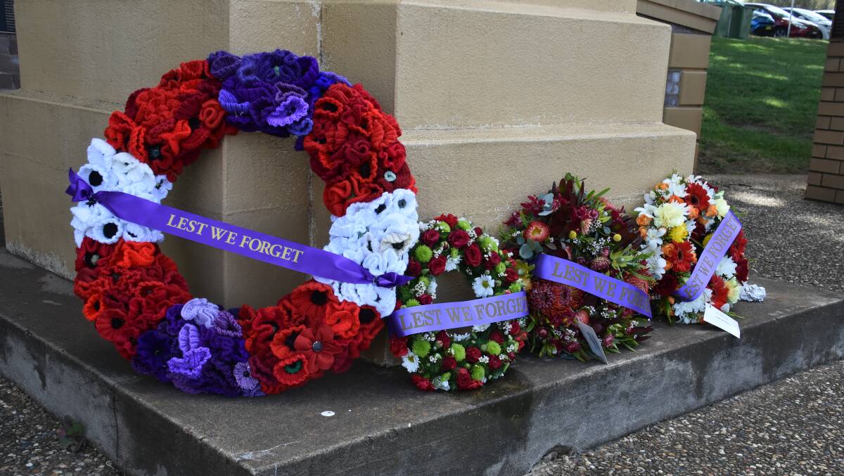 The wreath made of knitted poppies was laid by David Davidson on behalf of the Royal Agricultural Society of NSW.