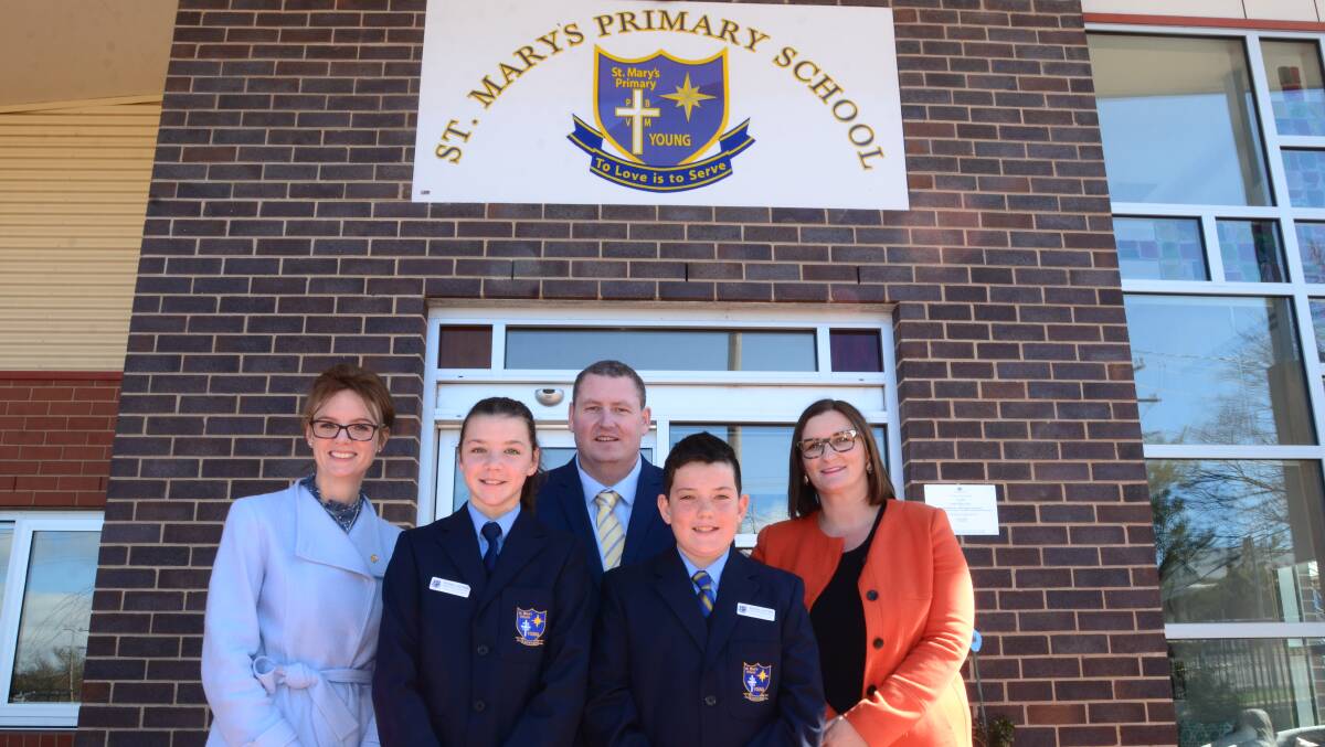 Member for Cootamundra Steph Cooke, St Mary's Primary School captains Maddie James and Josh Cameron, principal Andrew Casey and Education Minister Sarah Mitchell.