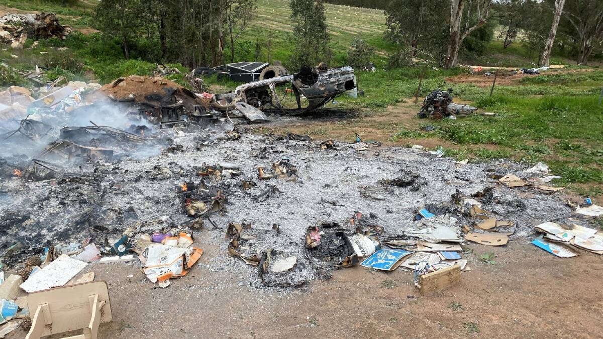 Waste material being burnt in a semi residential area of Young. Photo: Hilltops Council