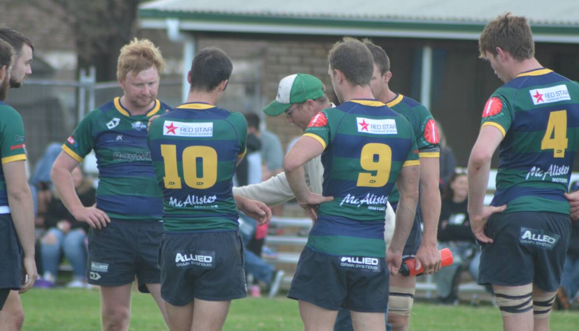 Ned Mullany speaks to his troops during a match earlier this year. The captain-coach will start at halfback against Cootamundra on Saturday.