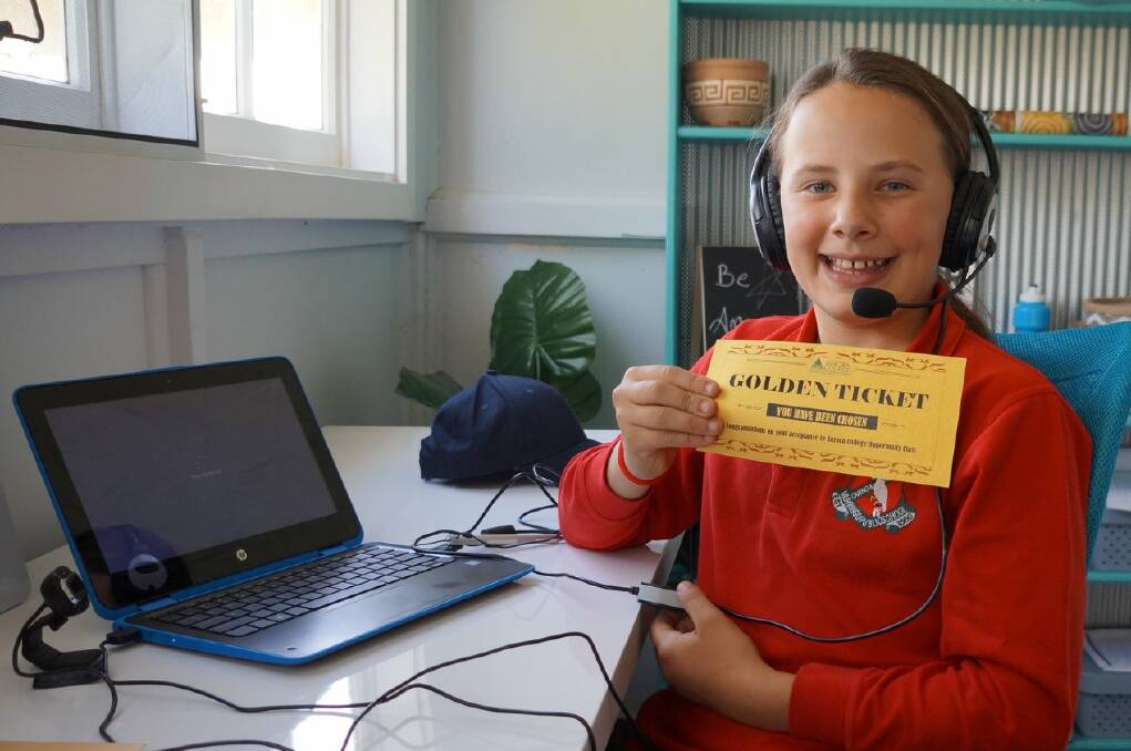 Year 5 Murringo student Sarah Miller and her ticket into the virtual classroom. Photo: contributed 