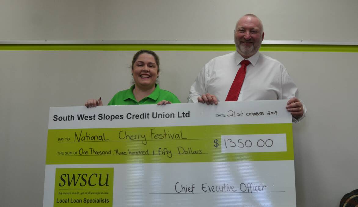 Caitlin Sheehan, National Cherry Festival president with sponsor South West Slopes Credit Union CEO Andrew Jones.