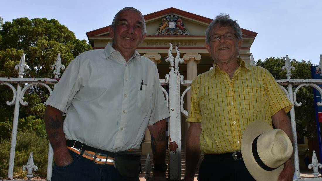 Steve Watkins, who says he once walked a tunnel in 1992 between the old courthouse and old jail, and history expert Joe Kinsela pictured in front of the old courthouse. Photo: file
