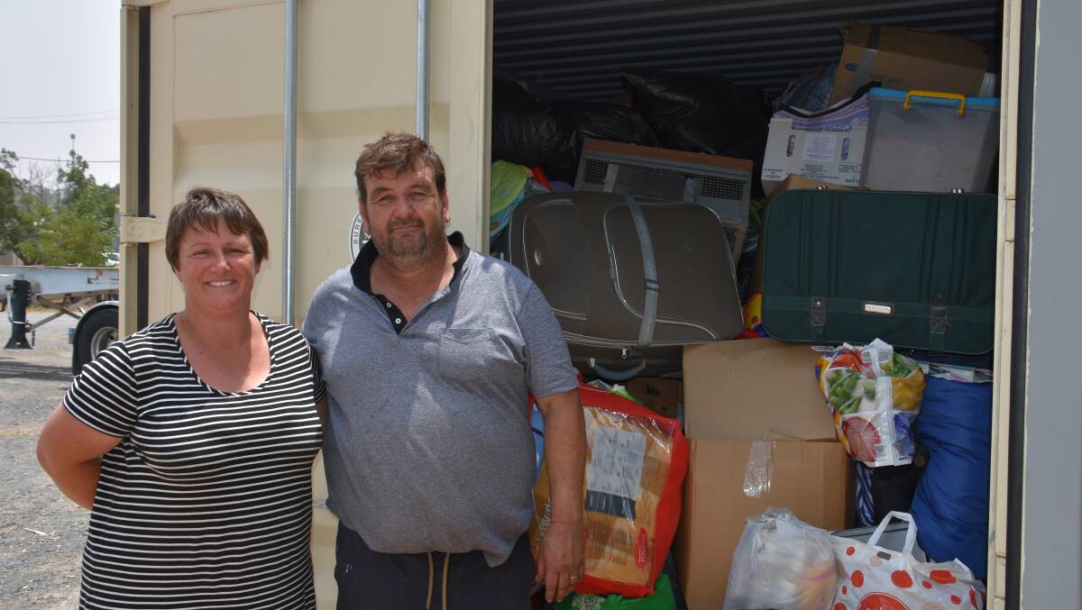 Rachel and Glenn Douglas of Douglas Transport are using their containers and truck to ship donations to Cobargo. Photo: Peter Guthrie