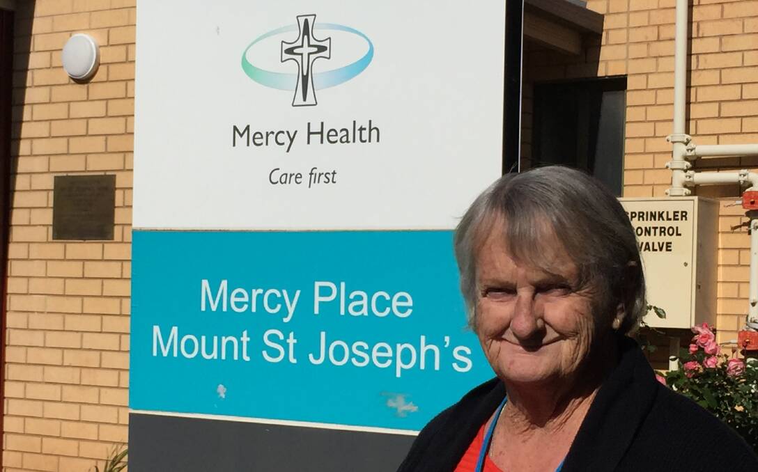 Sue Hardy has been calling bingo at Mercy Place Mount St Joseph's for about 18 years. Photo: Peter Guthrie