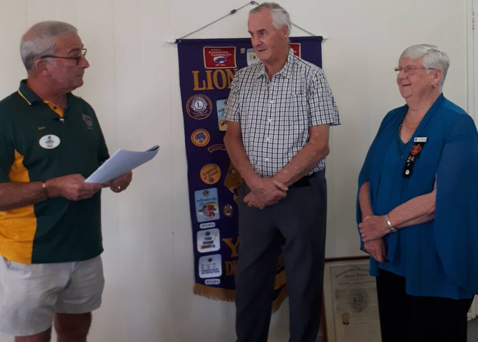 Lions club District Governor Stuart Freudenstein inducting new member David Harty sponsored by Lion Claire Goodwin. Photo: contributed 