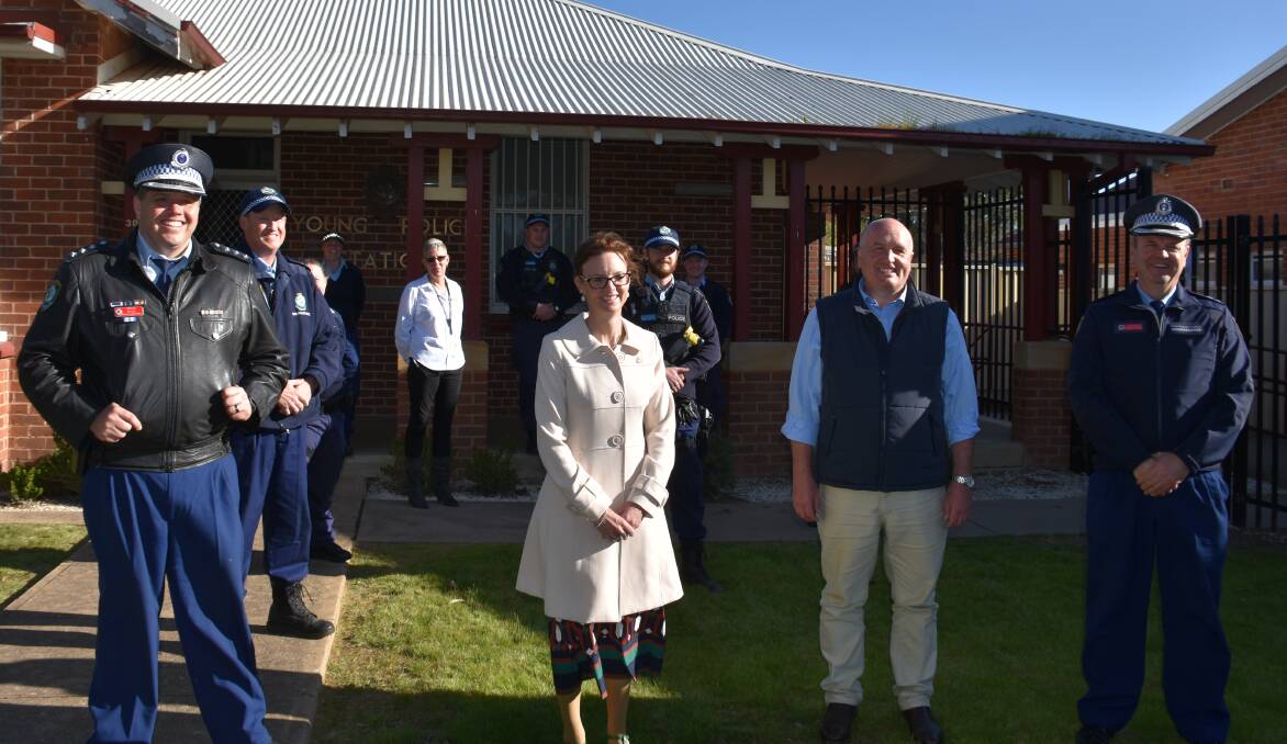 Cootamundra MP Steph Cooke and Police Minister David Elliott with officers from Young Police and the Hume Police District. Photo by Peter Guthrie