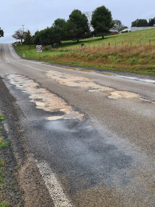 This photo showing deep patches in the road between Murringo and Boorowa was posted to the Young NSW Community Group Facebook page. Photo: Tim Fanning/Facebook