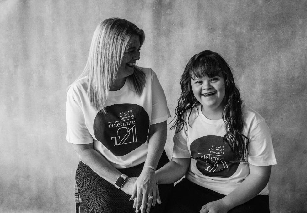 Wollongong's Vanessa Risku with daughter Kiara, who were also photographed in the fundraising T21 T-shirts. Picture: Ann Young
