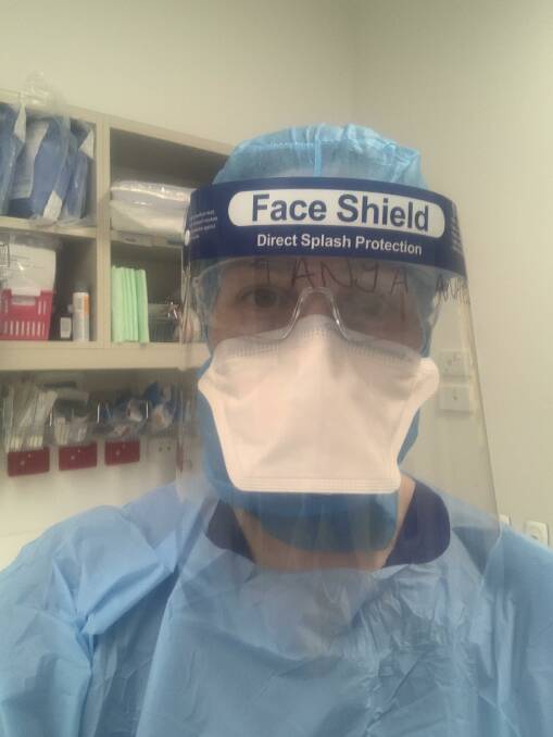 Dr Selak with some of the personal protective equipment that is vital when working with COVID-19 patients. Picture: Supplied