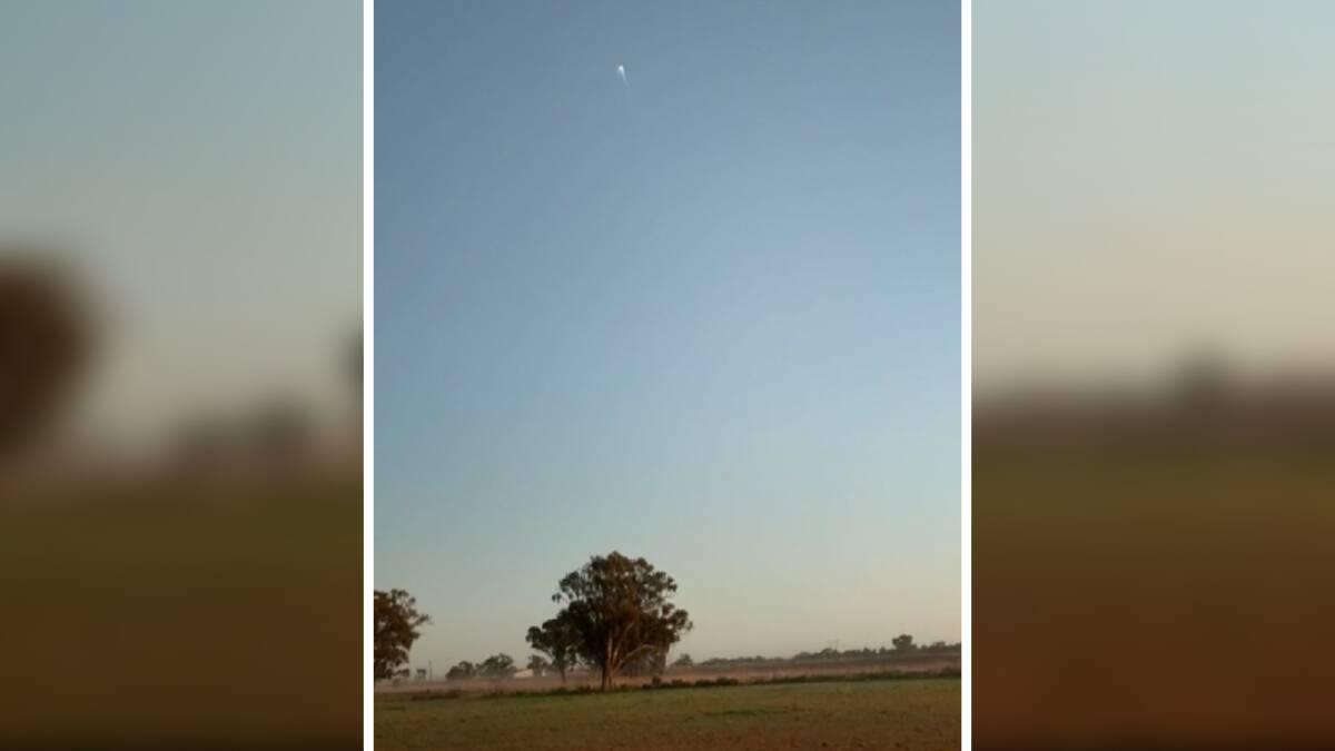 FIREBALL: Keen-eyed residents captured footage of the meteorite soaring above the Riverina at the same time reports of shaking windows and loud booms were made. Photo: Elizabeth Habermann