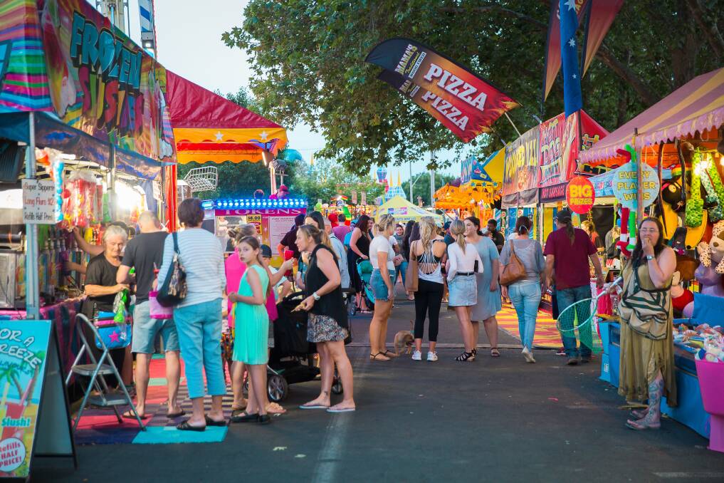 Hive of activity: The Cherry Festival is always popular with stalls, amusements, live music and the always popular fireworks display. Photo: Clover and Rye Photography.