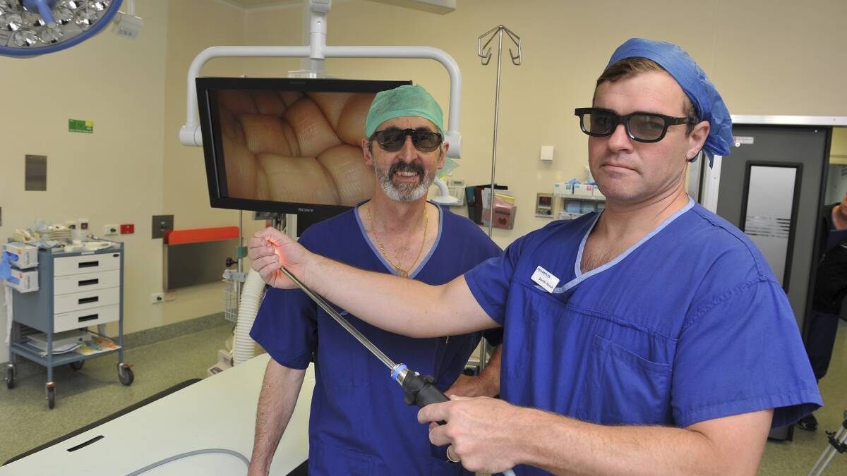 Groundbreaking: St John of God Ballarat surgeon David Deutscher and Daniel Hinch with the new three-dimensional technology aimed at streamlining surgical procedures. Picture: Lachlan Bence