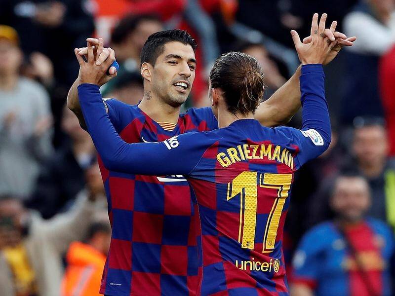 Barcelona will resume their La Liga title defence against Real Mallorca in two weeks.